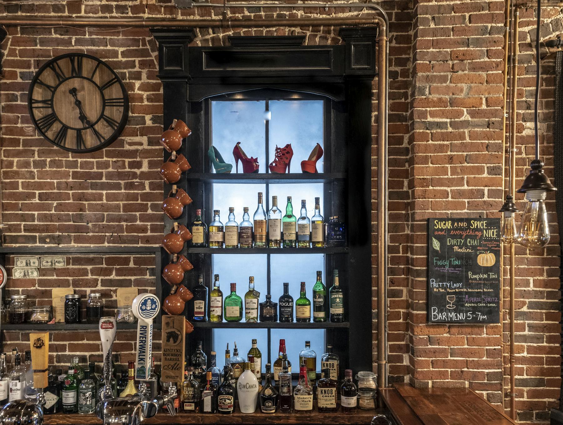 a close up of a shelf filled with bottles